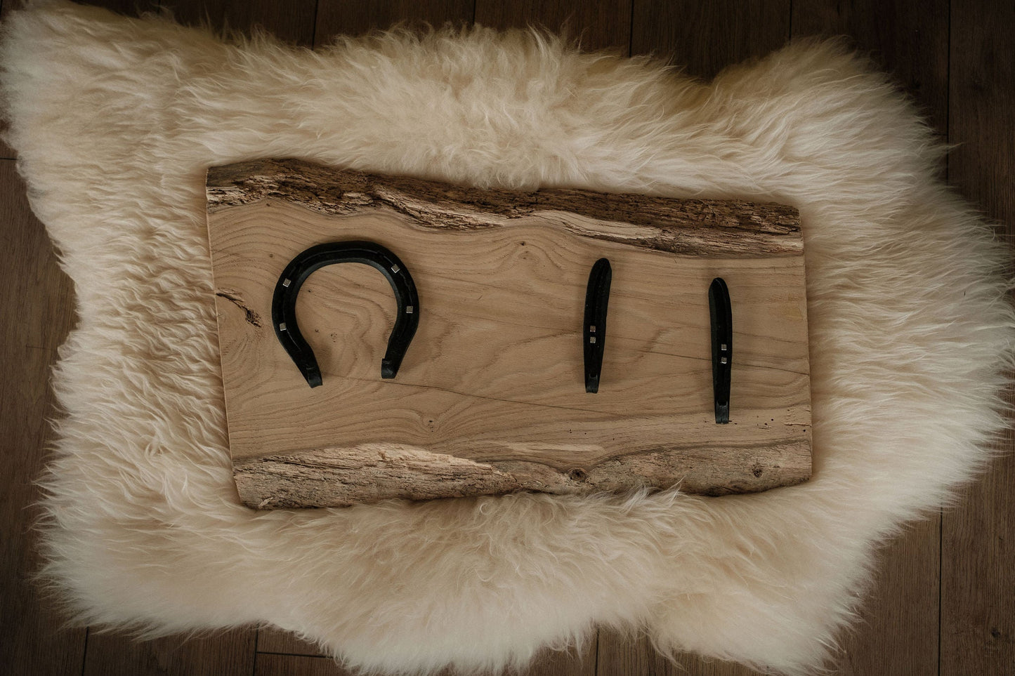 Horseshoe hooks mounted on live edge, kiln-dried Sweet Chestnut board