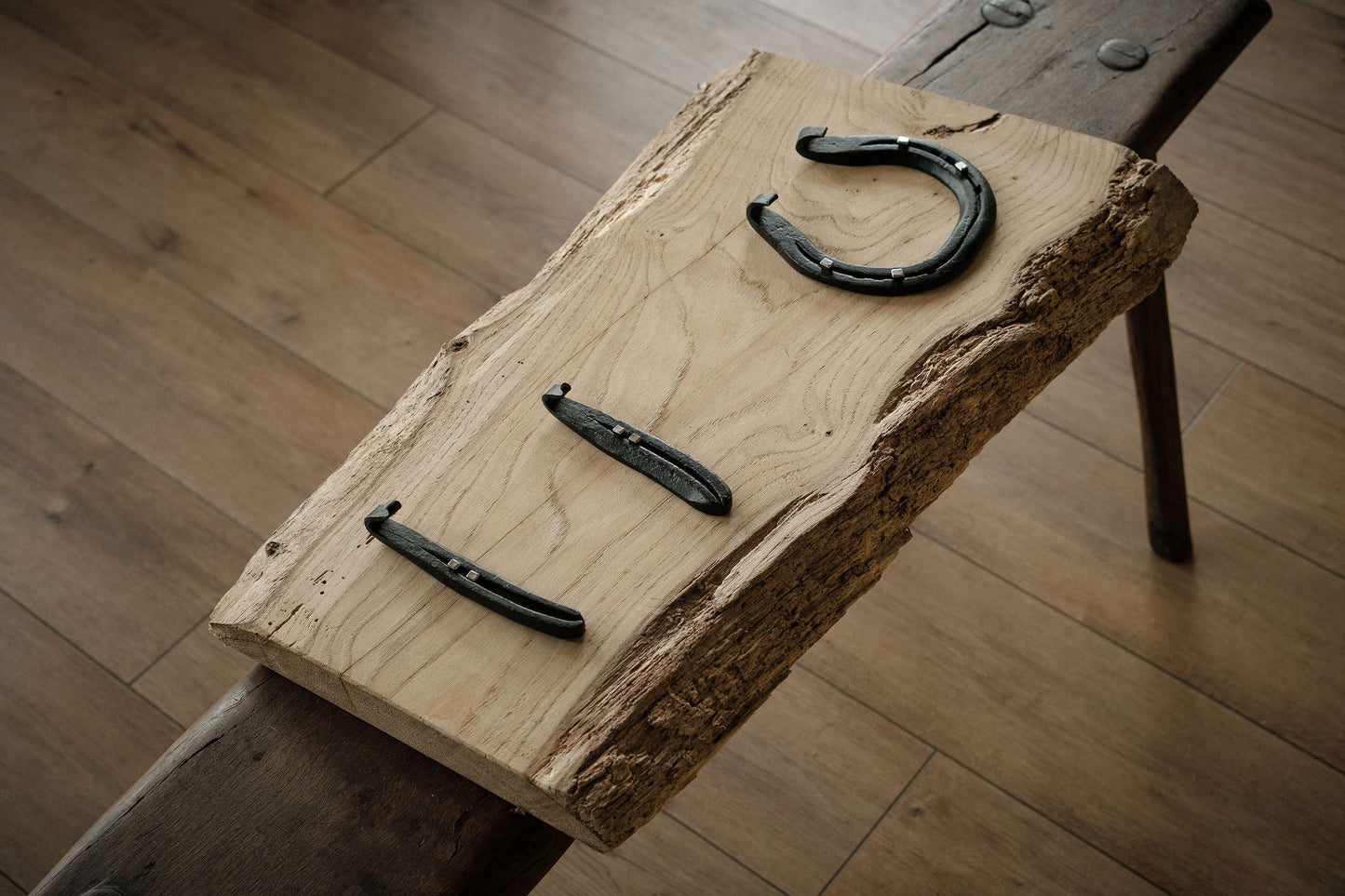Horseshoe hooks mounted on live edge, kiln-dried Sweet Chestnut board
